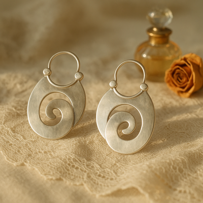 ORECCHINI™ | Design Artistico in Acciaio Lucido